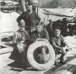 Captain Daniel on the scow Rambler - Barney Daniel Collection.